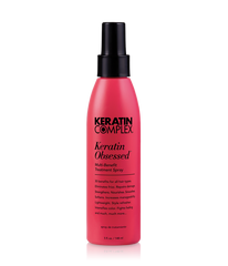 Keratin Complex Keratin Obsessed treatment spray bottle, red-pink with black cap