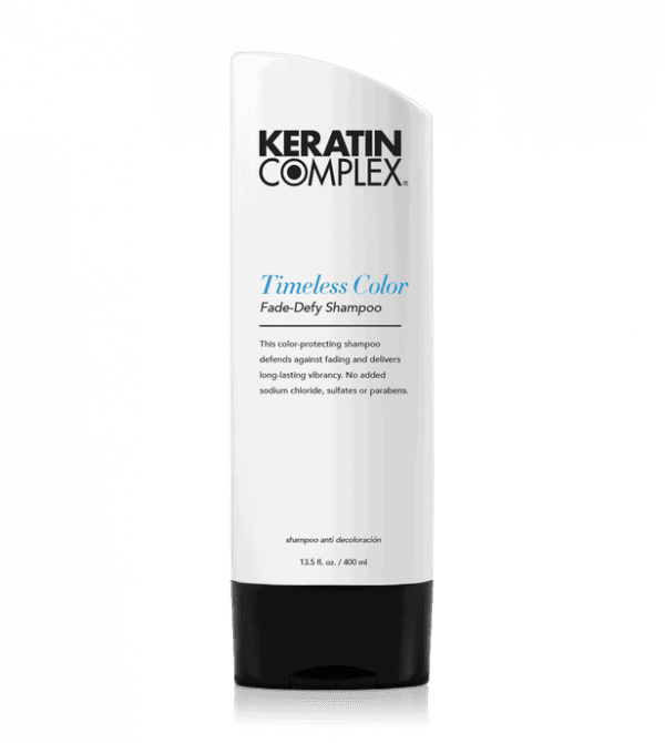 Shampoo bottle, Keratin Complex Timeless Color face-defy, white with black cap.