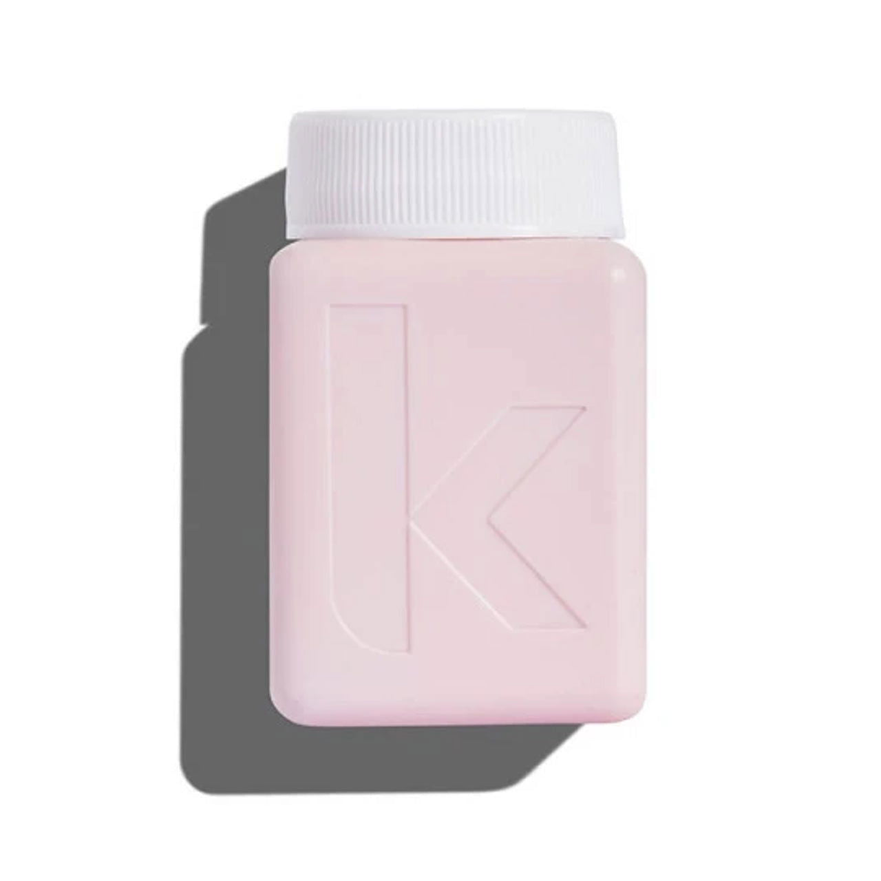 Kevin Murphy Angel Wash 40 ml bottle with white cap, pink translucent body