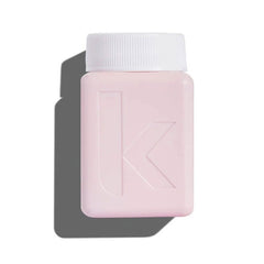 Kevin Murphy Angel Wash 40 ml bottle with white cap, pink translucent body