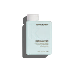 Kevin Murphy Motion Lotion bottle, turquoise with white cap and clear label