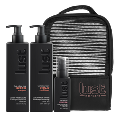 Haircare repair gift set with black shampoo, conditioner, luxury oil bottles and pouch