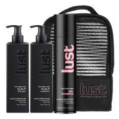 Haircare gift set with black bottles, dry shampoo can, and zip pouch