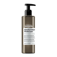L'Oreal Professionnel Absolut Repair molecular rinse-off serum bottle with black pump, clear amber.