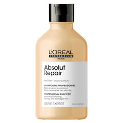 Beige shampoo bottle with black cap, Absolut Repair label