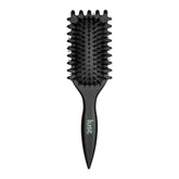 Black paddle hair brush with dense bristles and Lust Eco logo handle