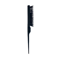 Teasing brush with dark handle and dense, short bristles