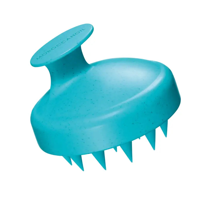 Turquoise scalp brush with domed top and short pointed bristles