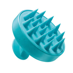 Turquoise scalp brush with arched base and dense pointed bristles