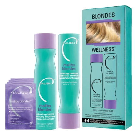 Hair wellness collection kit with teal and purple bottles and matching box