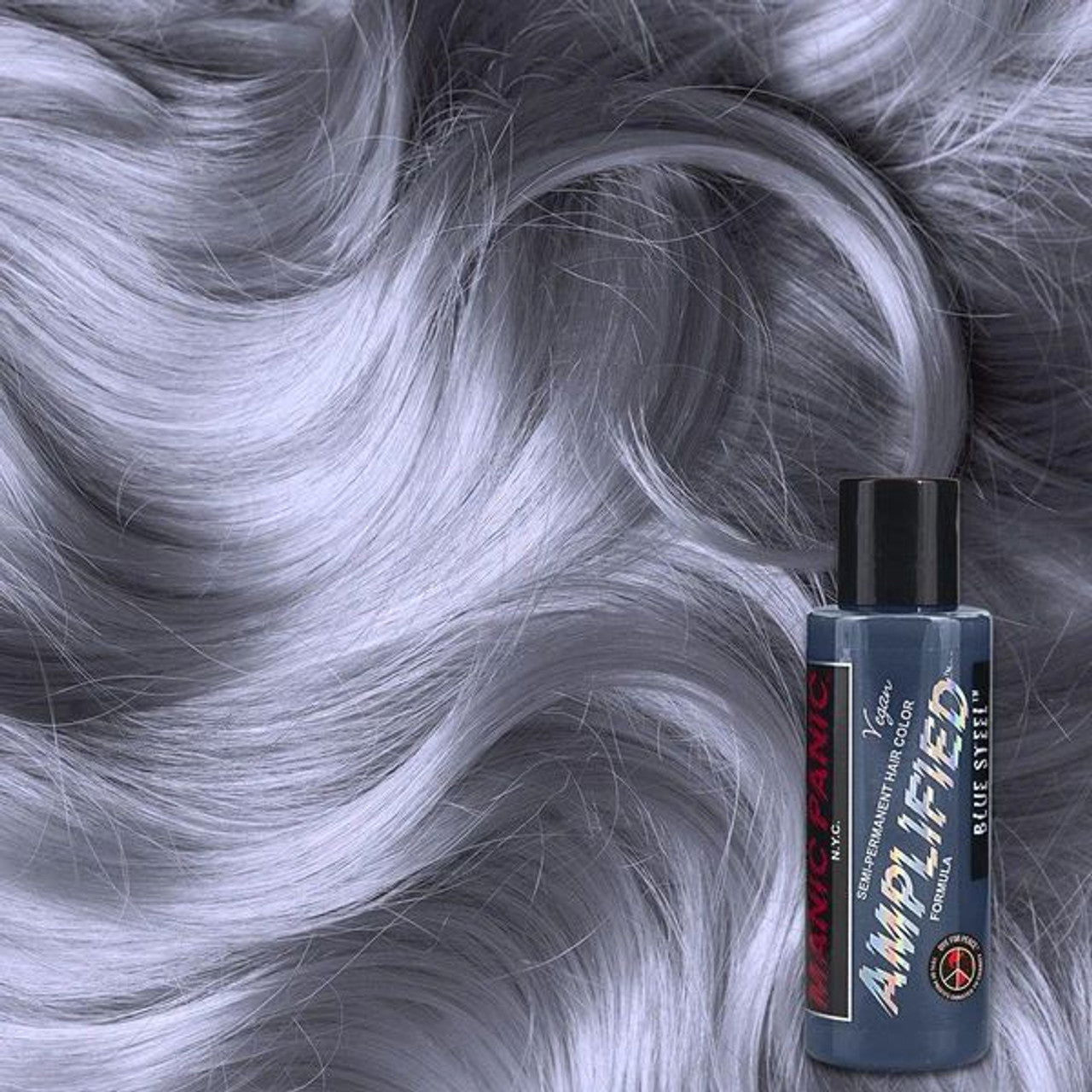 Hair dye bottle with blue steel shade, shown on light silver hair
