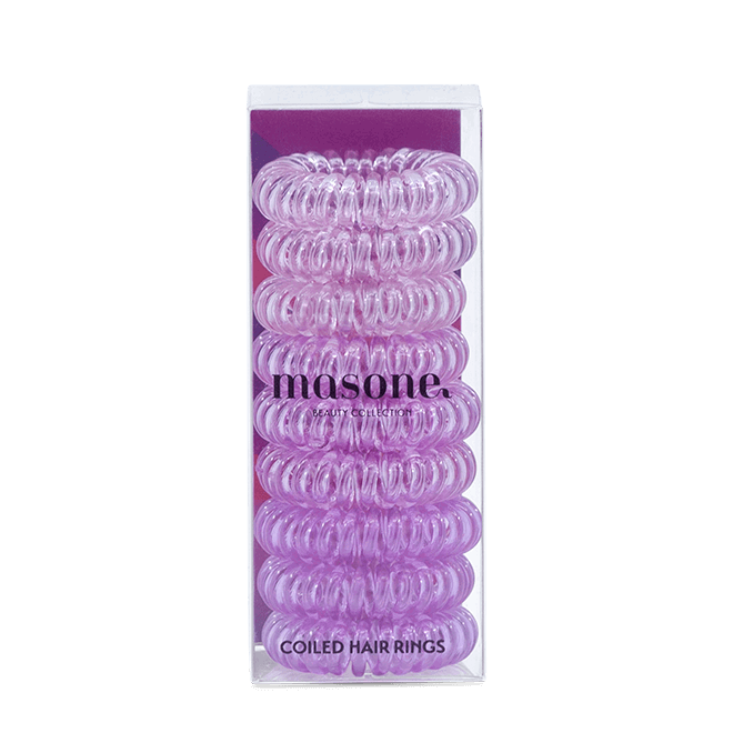 Coiled hair rings in violet-purple spiral twists, in Masone packaging