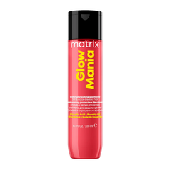 Red-pink shampoo bottle: Matrix Glow Mania 300 ml, black cap.
