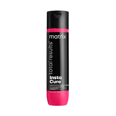 Hair conditioner bottle with black and pink matrix branding