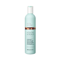 Shampoo bottle, light teal, flip-top cap, Volume Solution label