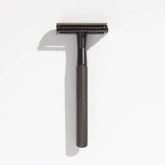 Gunmetal safety razor with textured handle and open comb head