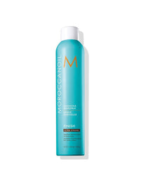 Moroccanoil luminous hairspray bottle, teal tube with gold M logo, white cap.