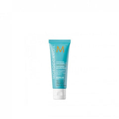 Moroccanoil mending infusion hair repair tube with turquoise cap
