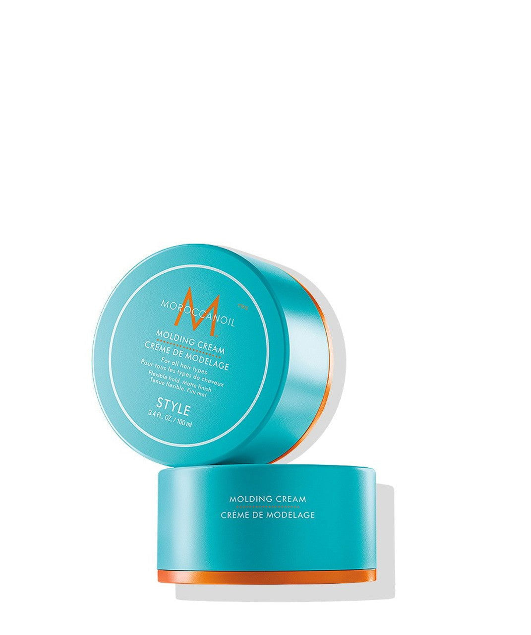 Teal hair molding cream jar with gold rim and open lid