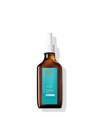 Moroccanoil oil scalp treatment bottle with white dropper and teal label, 45 ml
