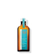 Moroccanoil Treatment Light bottle with teal label, 100 ml