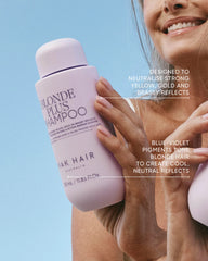 Purple and pink shampoo bottle for blonde hair