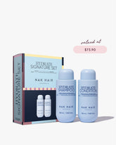 NAK Hair Hydrate Signature Set gift pack with shampoo and conditioner bottles