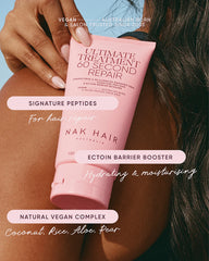 Pink hair repair treatment tube held near dark hair, 150 ml