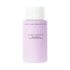 NAK Hair ORI Lab Blonde conditioner bottle, translucent purple with white cap