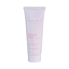NAK Hair Replends Moisture Mask travel tube, 50 ml, pale lavender with pink text