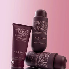 Burgundy Structure Complex Protein Shampoo bottle, tube, and jar containers