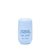 Travel-size hydrate conditioner bottle, light blue with HYDRATE CONDITION and NAK Hair