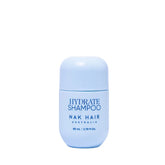 NAK Hair Australia Hydrate Shampoo travel size bottle, 80 ml, blue text label