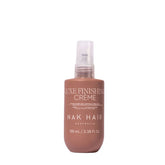 NAK Hair Luxe Finishing Creme 100 ml pump bottle, brown tinted bottle