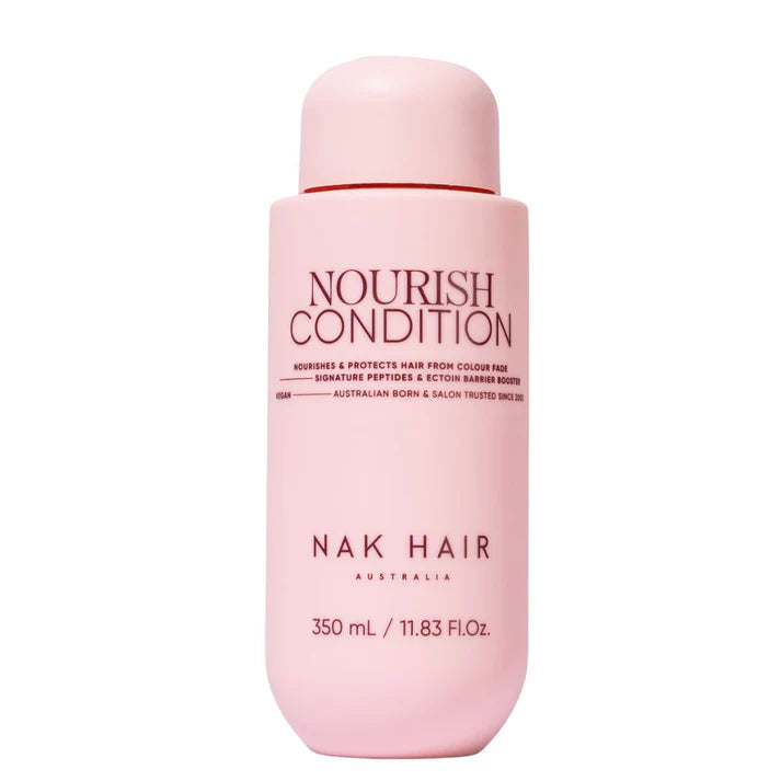 Pink Nourish conditioner bottle, 350 ml, with NAK Hair branding and red cap