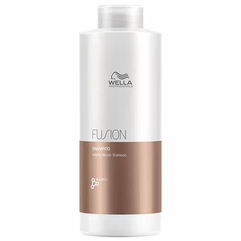 White Wella Fusion shampoo bottle with Wella logo and 'Shampoo' label