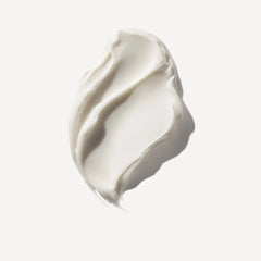 Thick white mask cream swatch with glossy texture