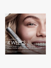 Olaplex LashBond lash serum bottle beside model eye with visible eyelashes.