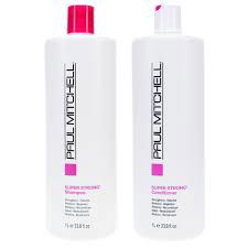 Hair care shampoo and conditioner duo, two white bottles with pink labels