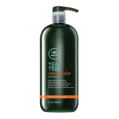 Dark green shampoo bottle with pump dispenser, Tea Tree Special Color Shampoo, 1L.
