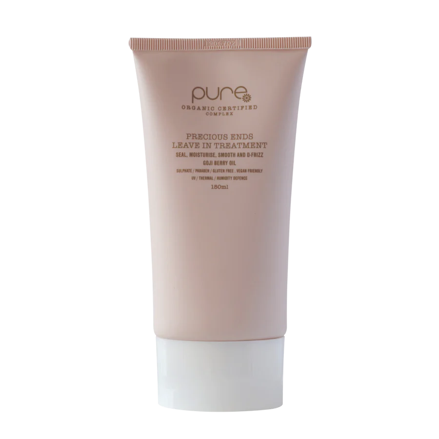 Leave-in hair treatment tube, pale pink with white cap