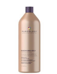 Pureology Nanoworks Gold shampoo bottle, beige bottle with purple cap and logo.