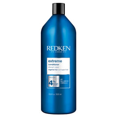 Redken Extreme conditioner bottle, blue with black cap and label
