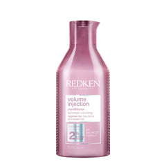 Redken Volume Injection conditioner bottle, purple pump bottle