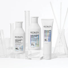 Redken acidic bonding concentrate hair care bottles and tube set in white