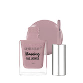 Nail lacquer bottle and cap, mauve-brown shade in glass container.