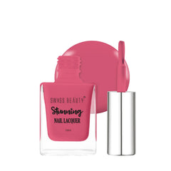 Pink nail lacquer shade bottle with open cap and applicator, 10ml.