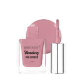 Rose-pink nail lacquer bottle with silver cap and brush applicator