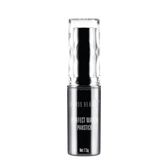 Foundation concealer panstick in creamy ivory shade, silver tube