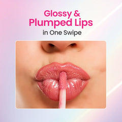 Glossy plumped lips with pink wetgloss applicator on the mouth